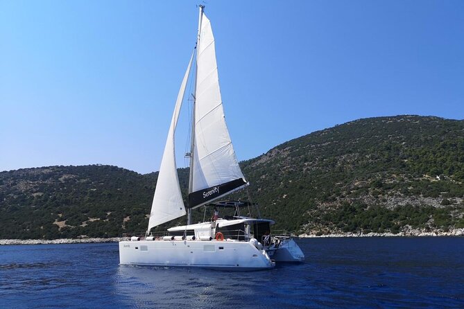 Santorini: Luxury Catamaran Cruise with Fresh Fish BBQ & Drinks - Mesa Pigadia, a quieter place to swim
