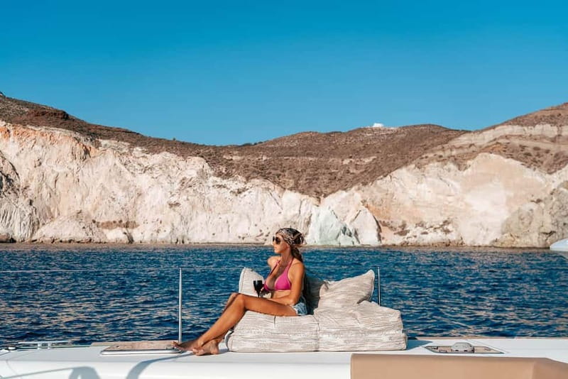 Santorini: Luxury Catamaran Cruise with Lunch, BBQ & Drinks - Crossing into the caldera and the Palea Kameni hot springs