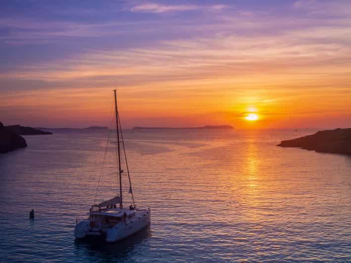 Santorini: Luxury Sunset Cruise with Dinner, BBQ, and Drinks - Why the view from the water matters