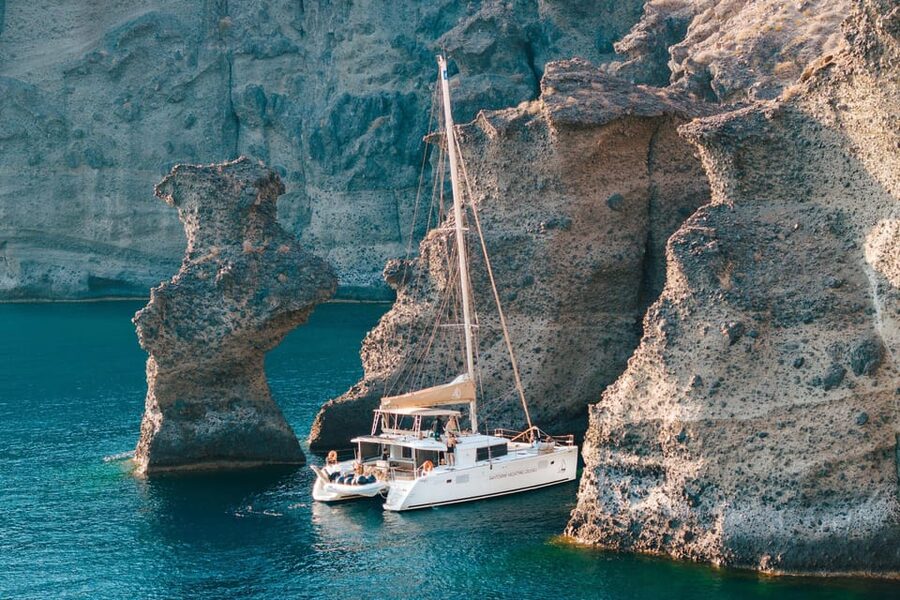Santorini: Luxury Sunset Cruise with Dinner, BBQ, and Drinks - Thirasia, dinner, and the open bar