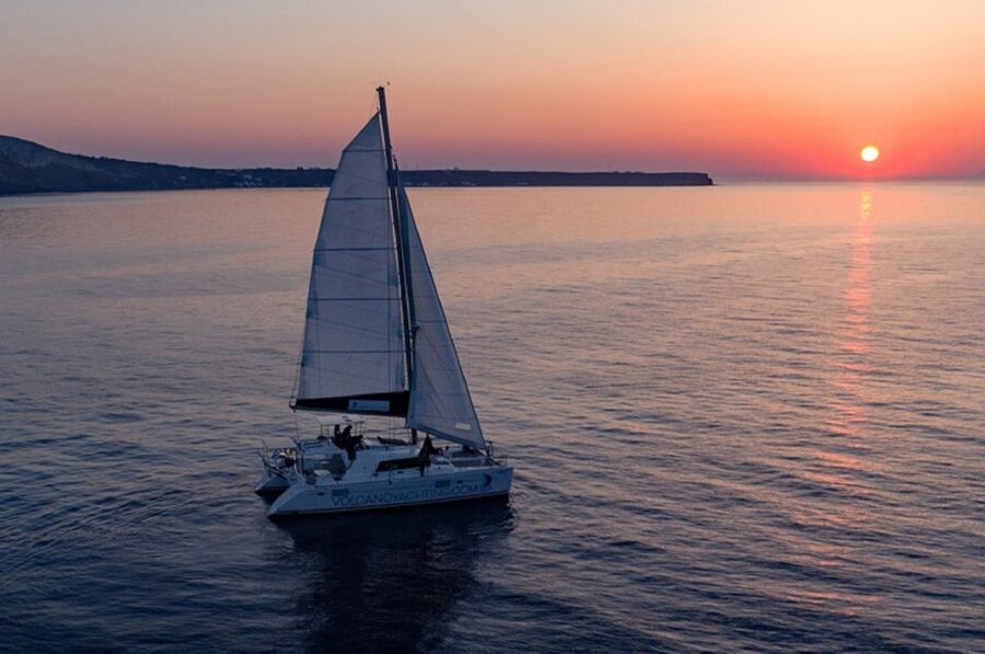 Santorini: Luxury Sunset Cruise with Dinner & Open Bar - Black, white, and red beaches from the sea