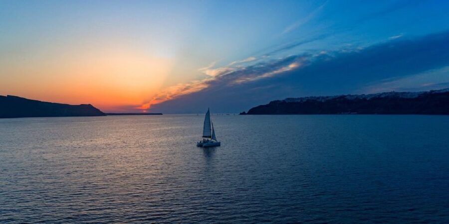 Santorini: Luxury Sunset Cruise with Dinner & Open Bar - Crew service and the practical details
