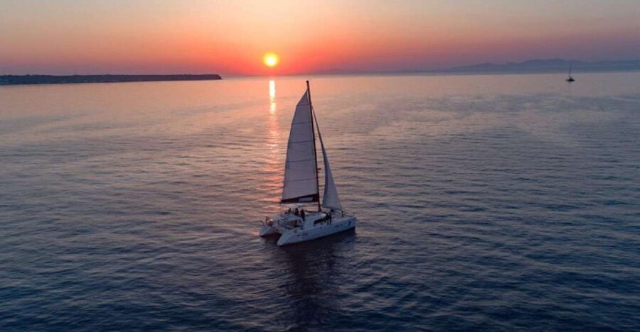 Santorini: Luxury Sunset Cruise with Dinner & Open Bar - Swimming beside the volcanic islands and hot springs