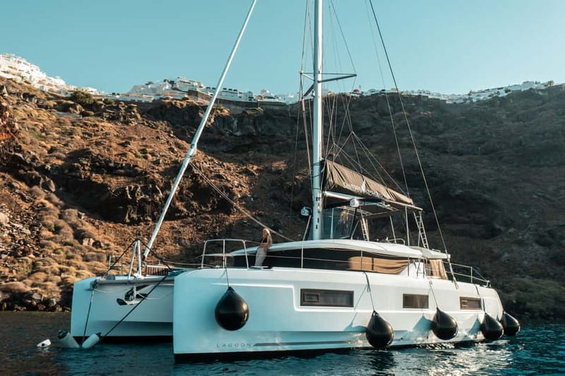 Santorini: Majestic Catamaran Cruise with Meal and Drinks - Ammoudi Bay and the first stretch of sailing
