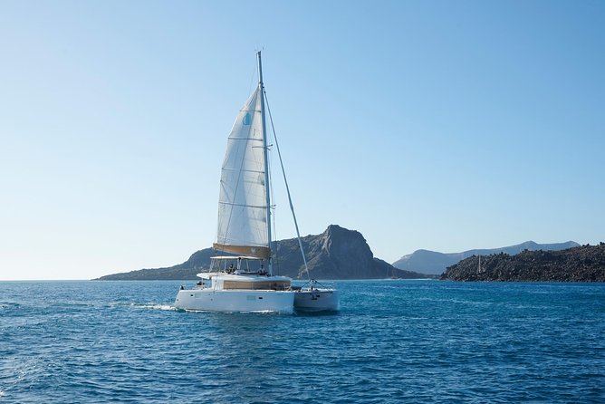 Santorini Platinum Catamaran Cruise with Meal, BBQ and Open Bar - Akrotiri lighthouse adds a quiet history stop