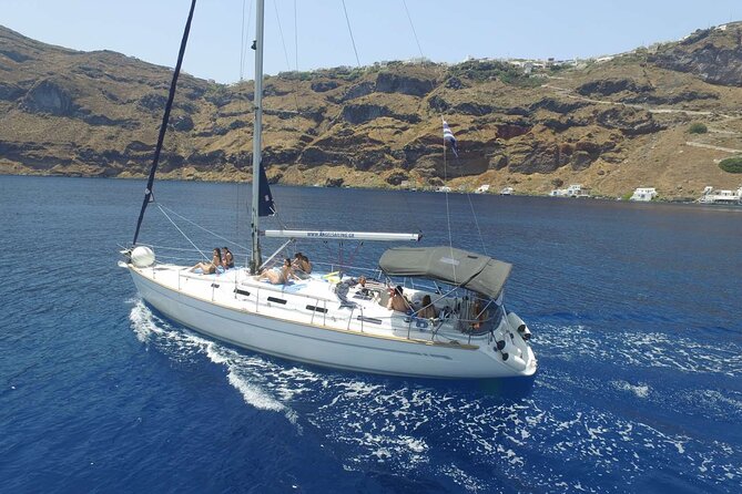 Santorini Private Daytime Sailing Cruise with Meal, Drinks &Transfer included - Red and White beaches from the sea