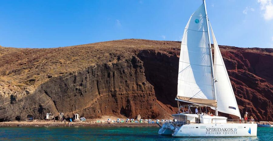 Santorini: Sailing Catamaran Cruise with BBQ and Drinks - Why the water is the right place to see Santorini