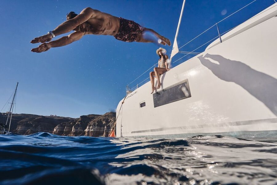 Santorini: Southern Island Luxury Catamaran Cruise with Meal - From your hotel to Vlichada Marina