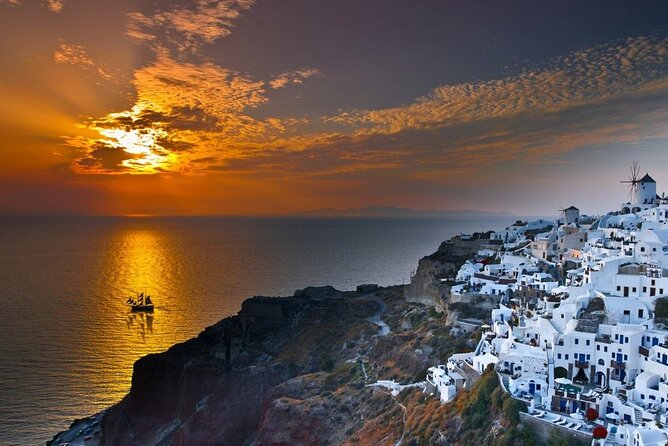 Santorini Sunset Dinner Cruise Including Nea Kameni Visit - Leaving Santorini’s caldera behind