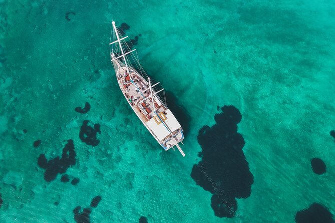 Sunset Dinner Cruise: Sunset, Swim, Drinks, and Dinner Onboard - Swimming, Snorkeling, and Time on Deck