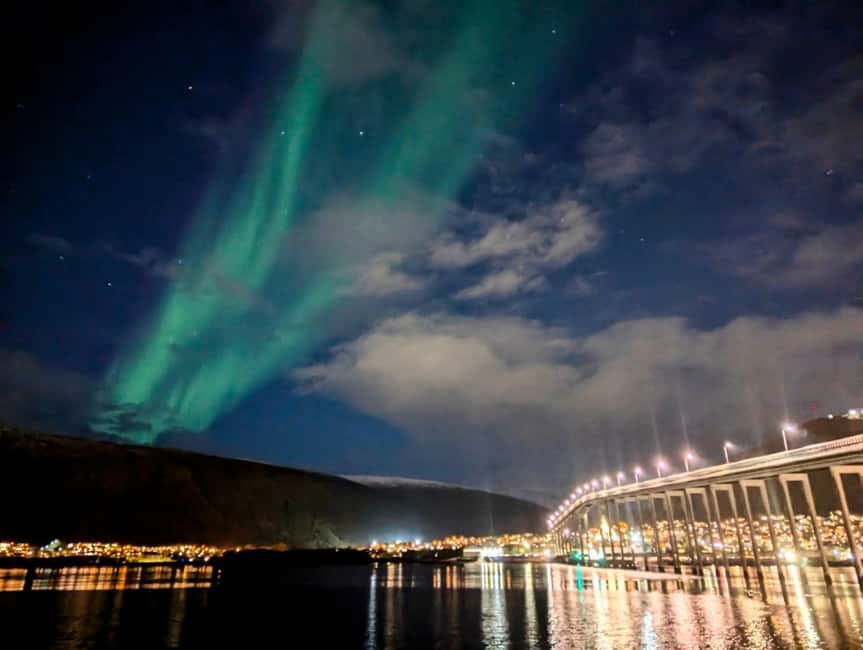 Tromsø: Evening dinner cruise with possible northern lights - The captain, the wheelhouse, and Arctic stories